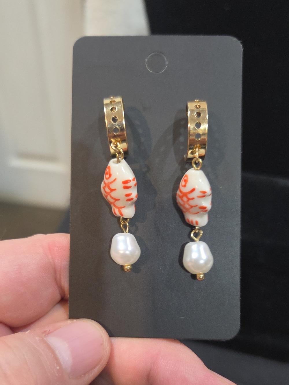 GOLDTONE HOOP WITH CERAMIC FISH AND FAUX PEARLS